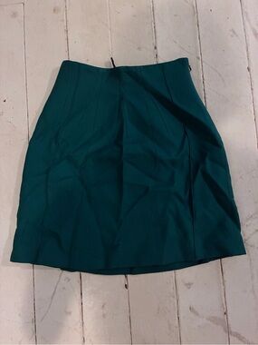 Jo No Fui Pleated Crepe Mini Skirt in Emerald Green